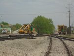 Looking East at the Track Equipment replacing & setting New Concrete Ties